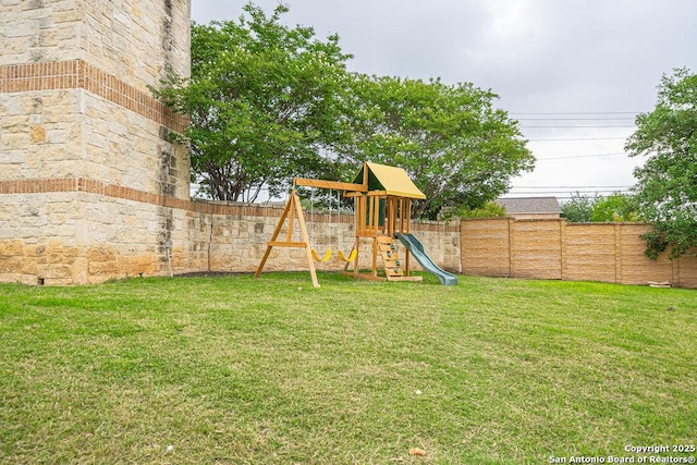view of yard with a playground