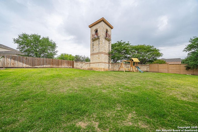 view of yard featuring a playground