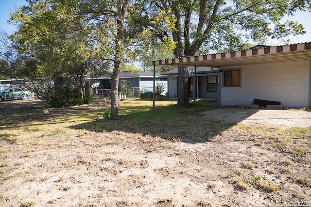 view of yard featuring a carport