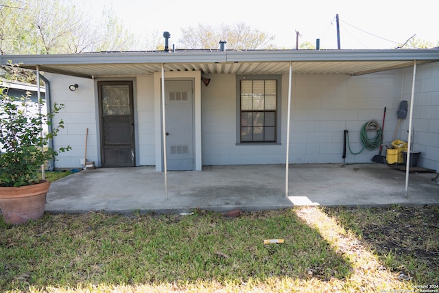 back of house with a patio area