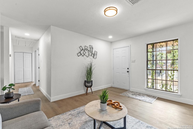 3327 K, San Antonio, TX 78220 - living area featuring attic access, wood finished floors, baseboards, and recessed lighting