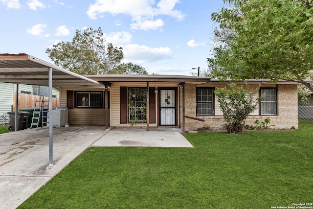 3327 K, San Antonio, TX 78220 - view of front of house featuring a carport and brick siding