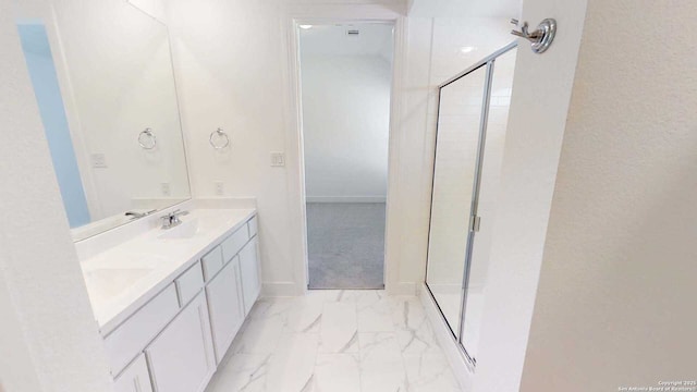 1818 Nettletree, New Braunfels, TX 78132 - bathroom featuring a stall shower, marble look tile flooring, baseboards, and double vanity