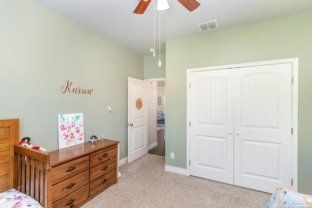 1345 Birch Ln, Fischer, TX 78623 - bedroom featuring light carpet, a closet, and ceiling fan