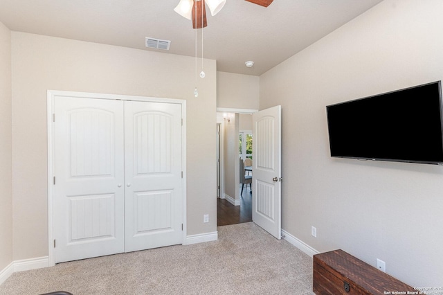 1345 Birch Ln, Fischer, TX 78623 - unfurnished bedroom featuring carpet, baseboards, a closet, and ceiling fan