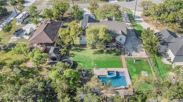 1345 Birch Ln, Fischer, TX 78623 - aerial view of property and surrounding area with a pool