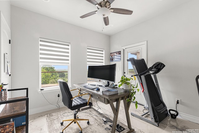 397 County Road 367, Hondo, TX 78861 - office area featuring marble finish floors, a ceiling fan, and baseboards