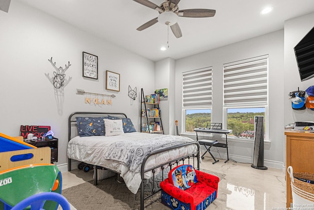397 County Road 367, Hondo, TX 78861 - bedroom featuring recessed lighting, marble finish floors, a ceiling fan, and baseboards