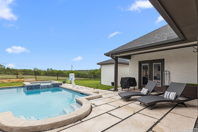 397 County Road 367, Hondo, TX 78861 - view of pool featuring a fenced backyard, a patio, and a pool with connected hot tub