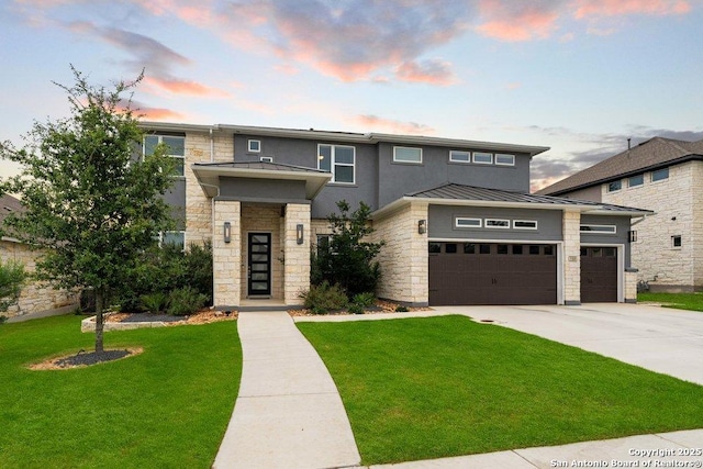 150 Cool Rock, Boerne, TX 78006 - prairie-style home with a standing seam roof, stone siding, driveway, and a front lawn