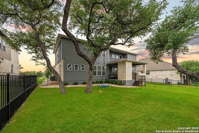 150 Cool Rock, Boerne, TX 78006 - back of house at dusk with stone siding and cooling unit