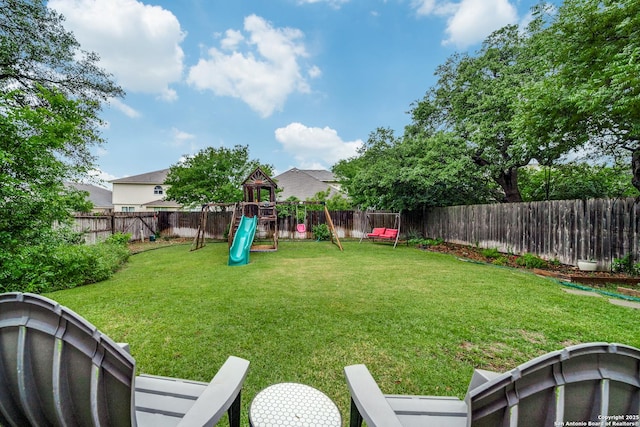 view of yard featuring a playground