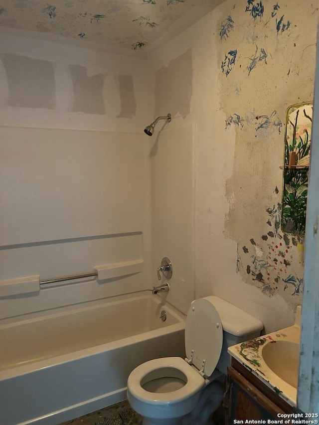 full bathroom with toilet, vanity, and bathtub / shower combination