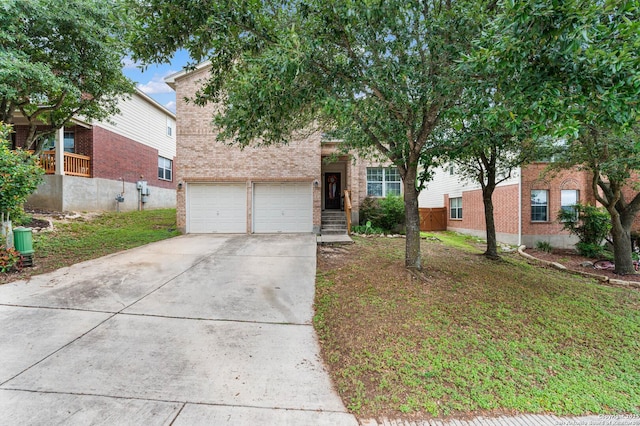 3911 Valencia Peak, San Antonio, TX 78261 - obstructed view of property with driveway, brick siding, and an attached garage
