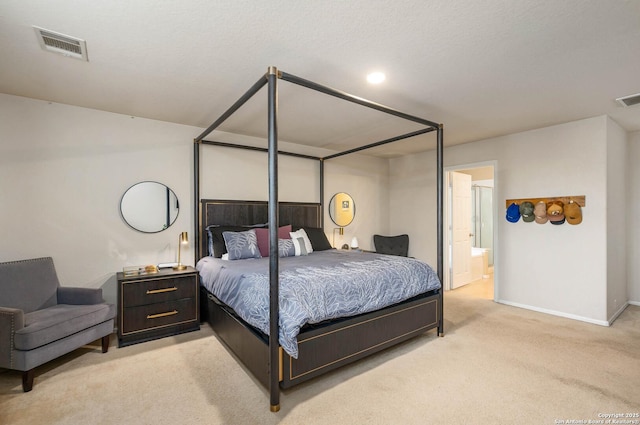 3911 Valencia Peak, San Antonio, TX 78261 - bedroom with light carpet, baseboards, and connected bathroom