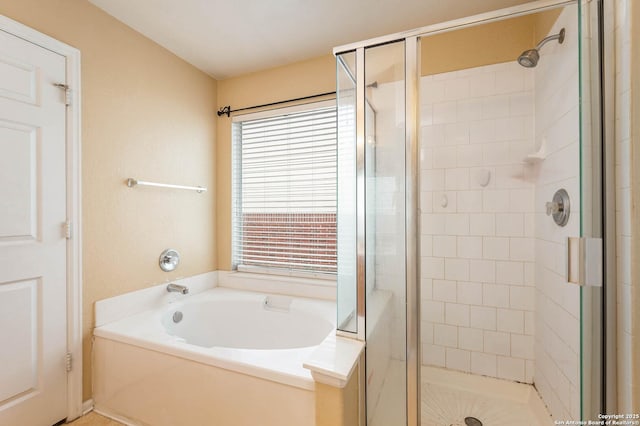 3911 Valencia Peak, San Antonio, TX 78261 - full bathroom featuring a shower stall and a bath