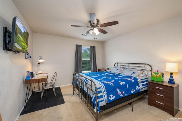 3911 Valencia Peak, San Antonio, TX 78261 - bedroom with light colored carpet, baseboards, and ceiling fan