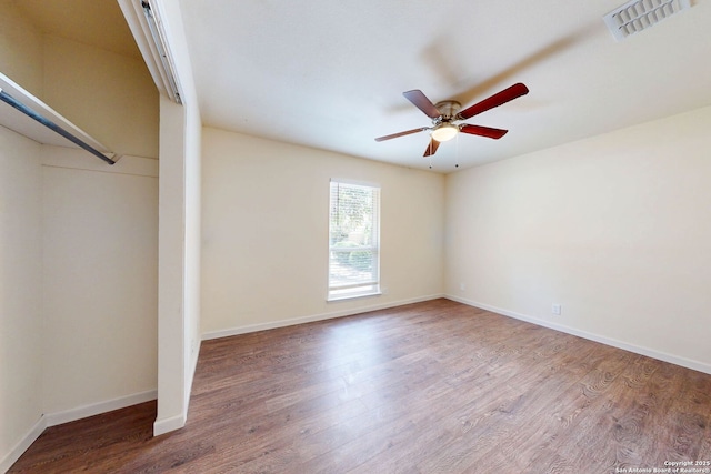 5423 Princess Diane, San Antonio, TX 78229 - unfurnished bedroom with wood finished floors, baseboards, ceiling fan, and a closet