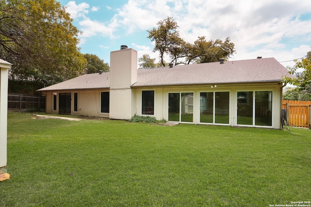 5423 Princess Diane, San Antonio, TX 78229 - back of house featuring a chimney and roof with shingles