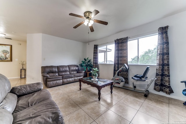 22319 Chimayo, San Antonio, TX 78258 - living area featuring a ceiling fan, light tile patterned floors, and baseboards