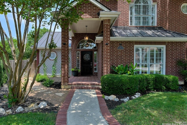 27 Sherborne Wood, San Antonio, TX 78218 - entrance to property featuring a standing seam roof, brick siding, and metal roof
