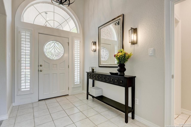 27 Sherborne Wood, San Antonio, TX 78218 - foyer entrance with healthy amount of natural light, light tile patterned floors, and baseboards