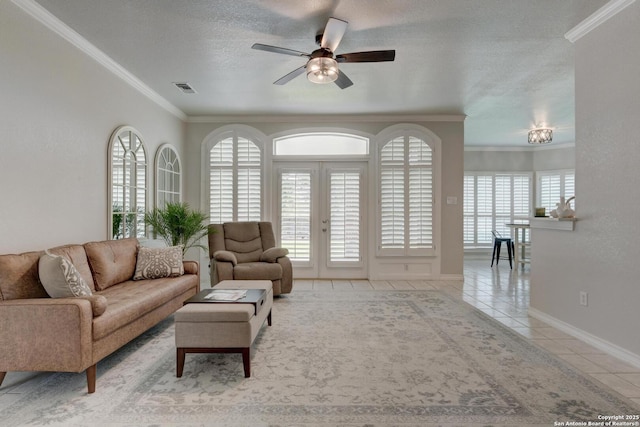 27 Sherborne Wood, San Antonio, TX 78218 - living area featuring crown molding, light tile patterned floors, ceiling fan, baseboards, and a textured ceiling