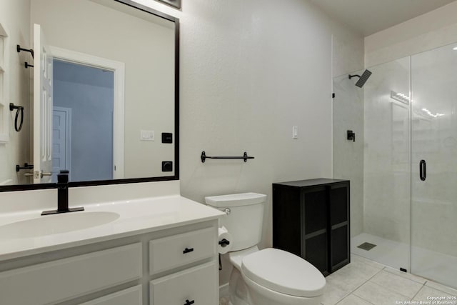27 Sherborne Wood, San Antonio, TX 78218 - full bathroom with toilet, a stall shower, vanity, and tile patterned flooring