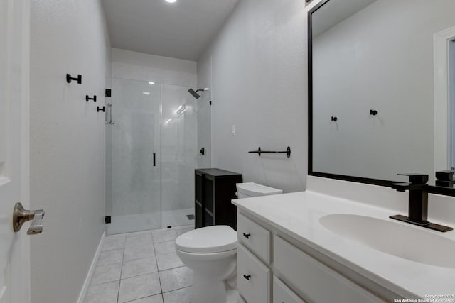 27 Sherborne Wood, San Antonio, TX 78218 - full bathroom with toilet, a stall shower, tile patterned flooring, vanity, and baseboards