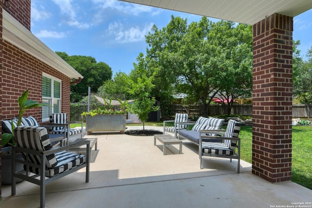 27 Sherborne Wood, San Antonio, TX 78218 - fenced backyard with a patio area and an outdoor hangout area