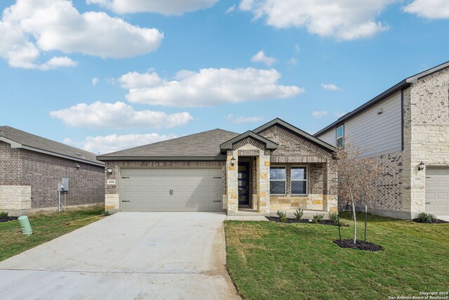 11515 Cottage Pt, San Antonio, TX 78254 - single story home with concrete driveway, a garage, a front yard, brick siding, and stone siding