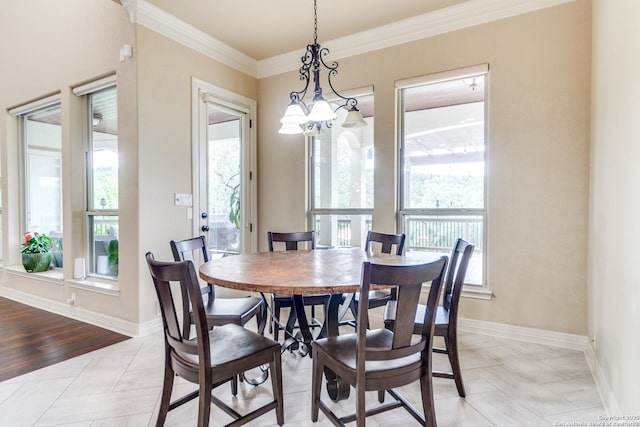 714 Ruidosa Downs, Helotes, TX 78023 - dining area featuring plenty of natural light, crown molding, light tile patterned flooring, baseboards, and a chandelier