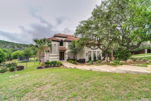714 Ruidosa Downs, Helotes, TX 78023 - mediterranean / spanish house with a tiled roof and stucco siding