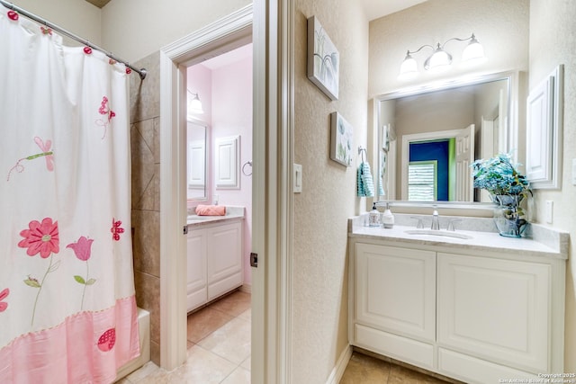 714 Ruidosa Downs, Helotes, TX 78023 - full bathroom featuring tile patterned floors, vanity, and shower / bath combo with shower curtain