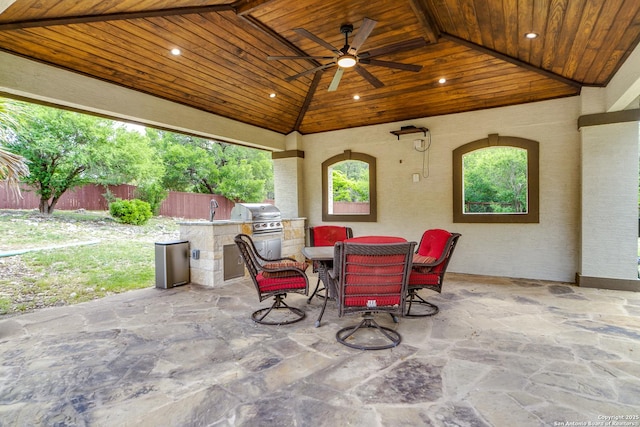 714 Ruidosa Downs, Helotes, TX 78023 - view of patio / terrace with a ceiling fan, fence, an outdoor kitchen, grilling area, and a sink