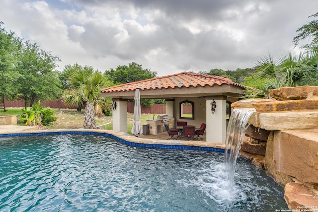 714 Ruidosa Downs, Helotes, TX 78023 - outdoor pool featuring an outdoor kitchen, a fenced backyard, a gazebo, and a patio area