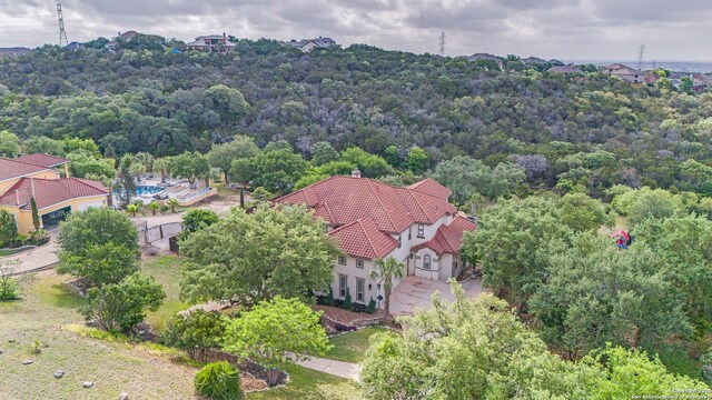 714 Ruidosa Downs, Helotes, TX 78023 - aerial view of a heavily wooded area
