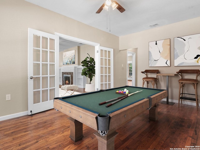 928 W Huisache, San Antonio, TX 78201 - game room featuring wood-type flooring, billiards table, a ceiling fan, and a fireplace