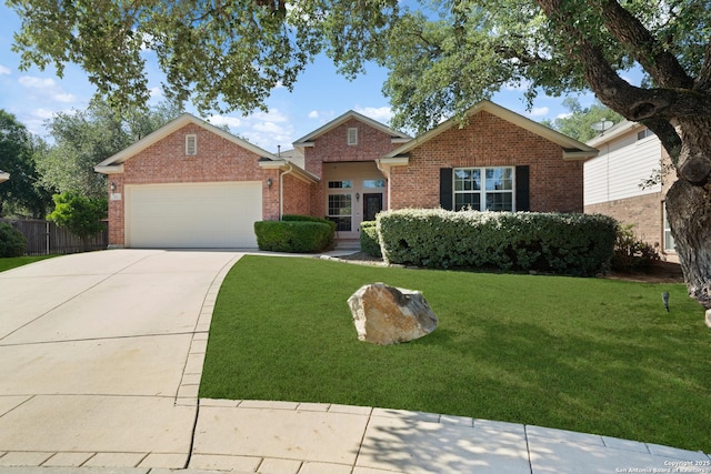 view of front of home featuring brick siding, an attached garage, and concrete driveway