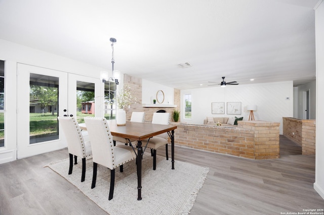 15031 Geronimo, San Antonio, TX 78254 - dining space featuring wood finished floors, french doors, and ceiling fan