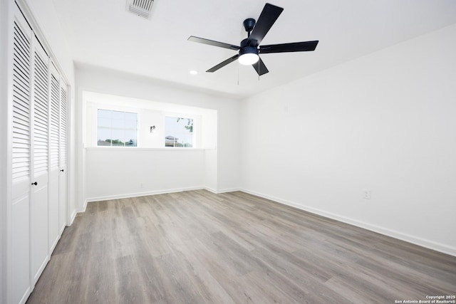 15031 Geronimo, San Antonio, TX 78254 - unfurnished bedroom featuring a closet, wood finished floors, baseboards, recessed lighting, and ceiling fan