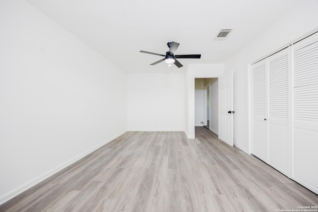 15031 Geronimo, San Antonio, TX 78254 - unfurnished bedroom featuring light wood-style flooring, baseboards, a closet, and ceiling fan