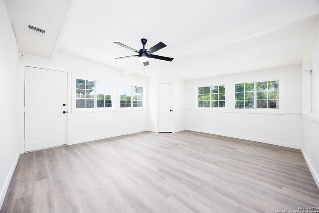 15031 Geronimo, San Antonio, TX 78254 - unfurnished living room with wood finished floors, a ceiling fan, and baseboards