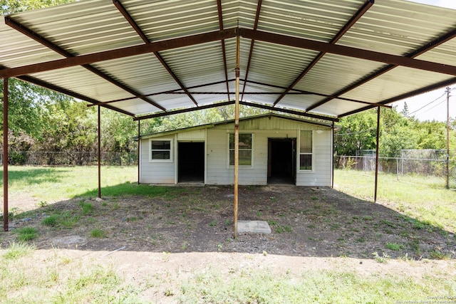 15031 Geronimo, San Antonio, TX 78254 - view of outbuilding featuring fence and a carport