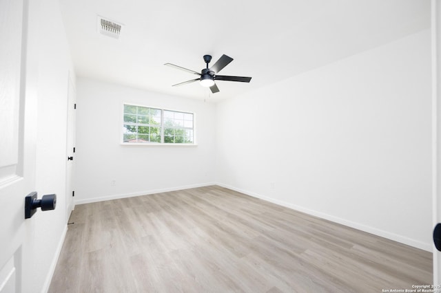 15031 Geronimo, San Antonio, TX 78254 - unfurnished room with light wood-style flooring, a ceiling fan, and baseboards