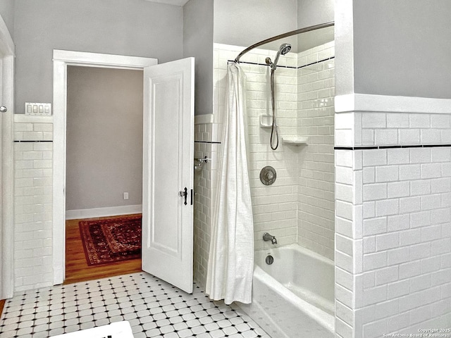 full bathroom with shower / bath combination with curtain