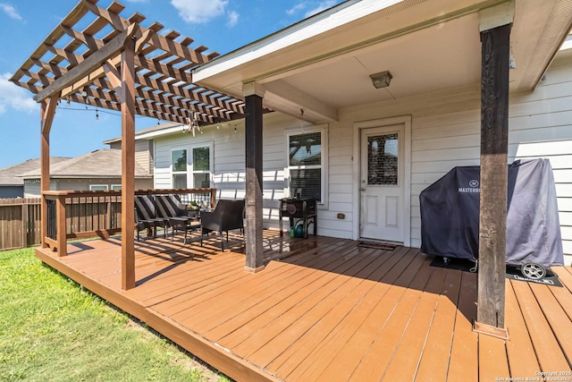 wooden terrace featuring a pergola and area for grilling
