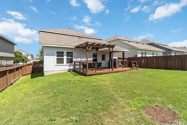 back of property featuring a pergola, a wooden deck, and a shingled roof