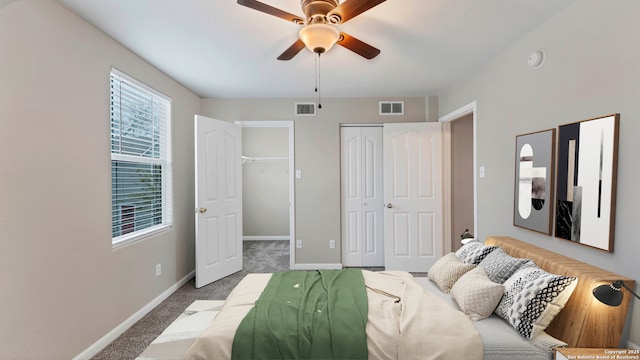 220 Trestle Tree Unit 112, San Marcos, TX 78666 - bedroom with carpet floors, baseboards, and ceiling fan