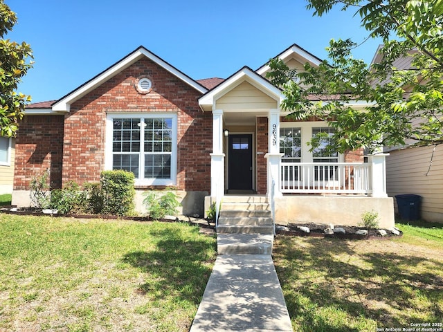 9639 Wild Horse, San Antonio, TX 78251 - view of front of home featuring brick siding, a porch, and a front yard